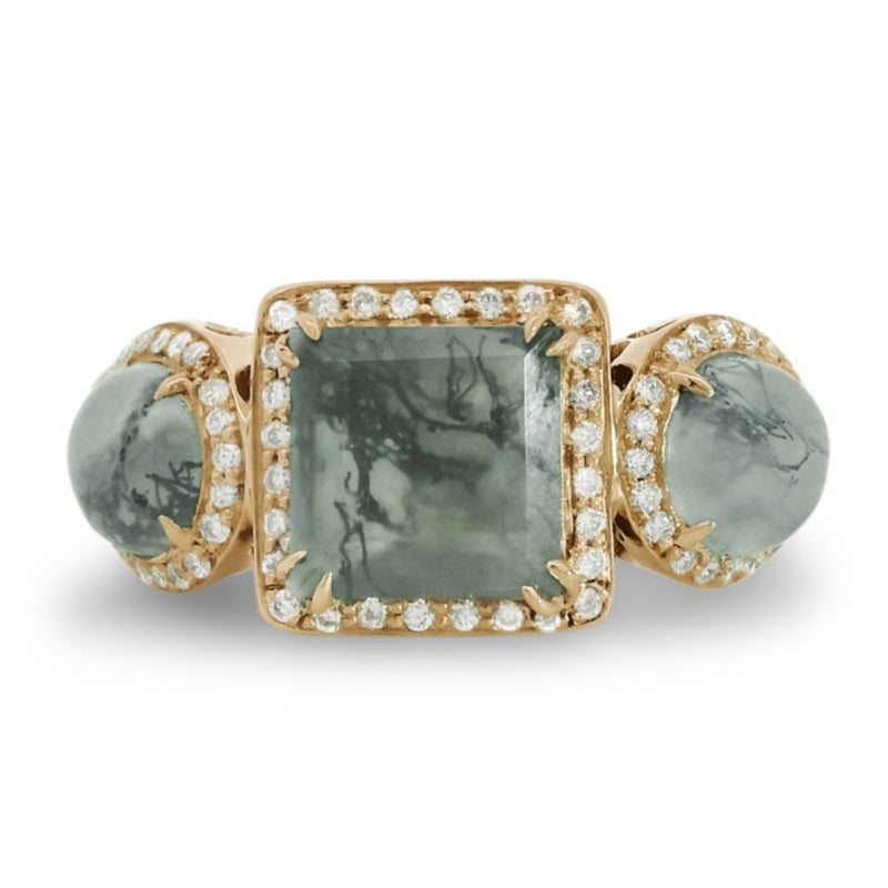A moss agate ring encircled with white diamond pavé set in 14kt yellow gold.