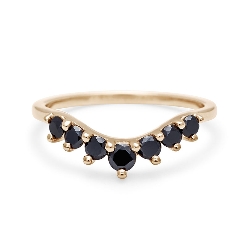 A curved 7 black diamond band set in yellow gold., Yellow Gold