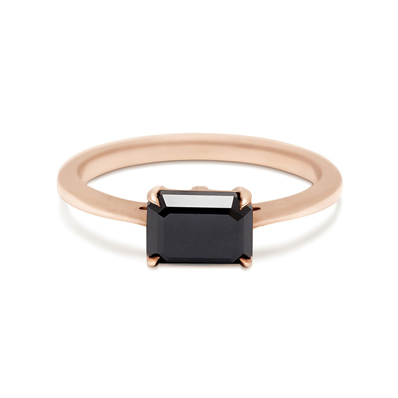 An east/west solitaire ring with an emerald shape black diamond stone set in rose gold., Rose Gold