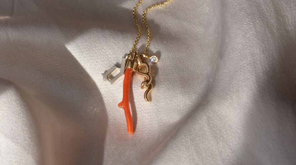 orange and golden pendant