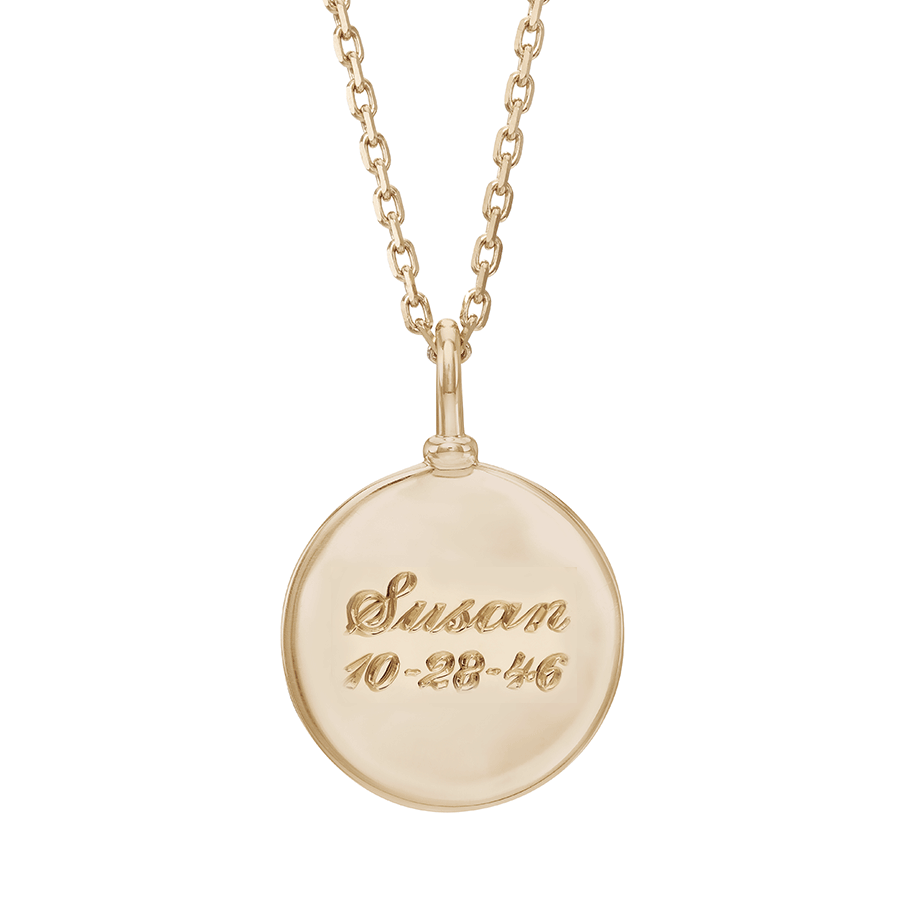 A 18mm plain gold charm set in yellow gold on a yellow gold chain with "Susan 10-28-46" engraved on., 18mm