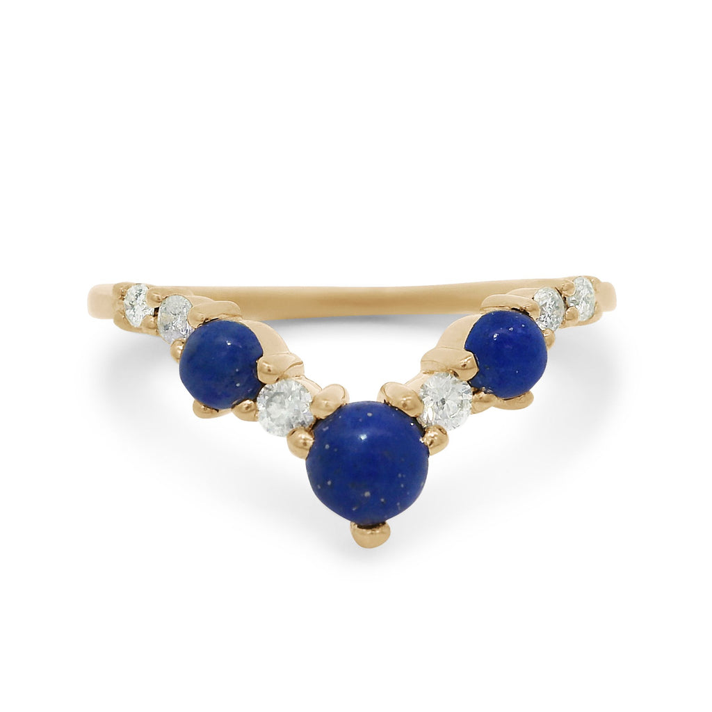 A lapis and white diamond band set in yellow gold. 