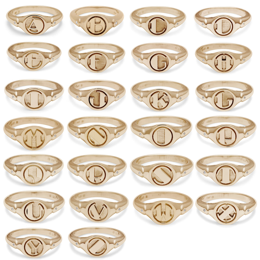 All letters in the alphabet listed for all yellow gold signet ring options.