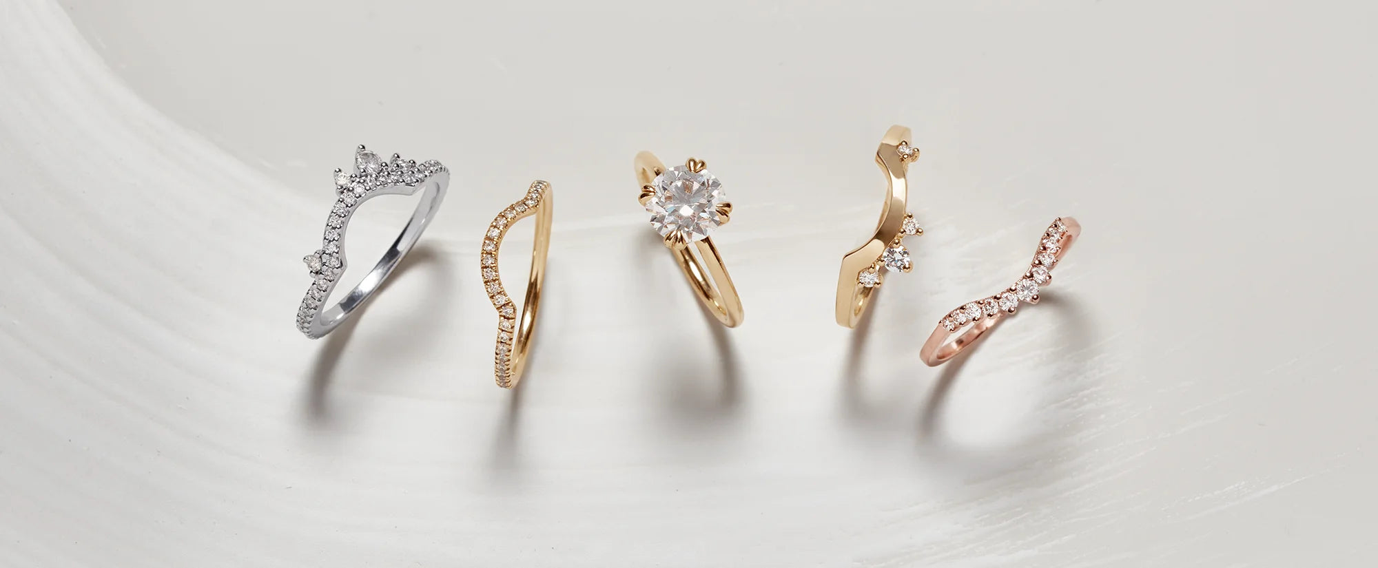 Men's and gender neutral wedding bands on anna sheffield's handmade objects dish