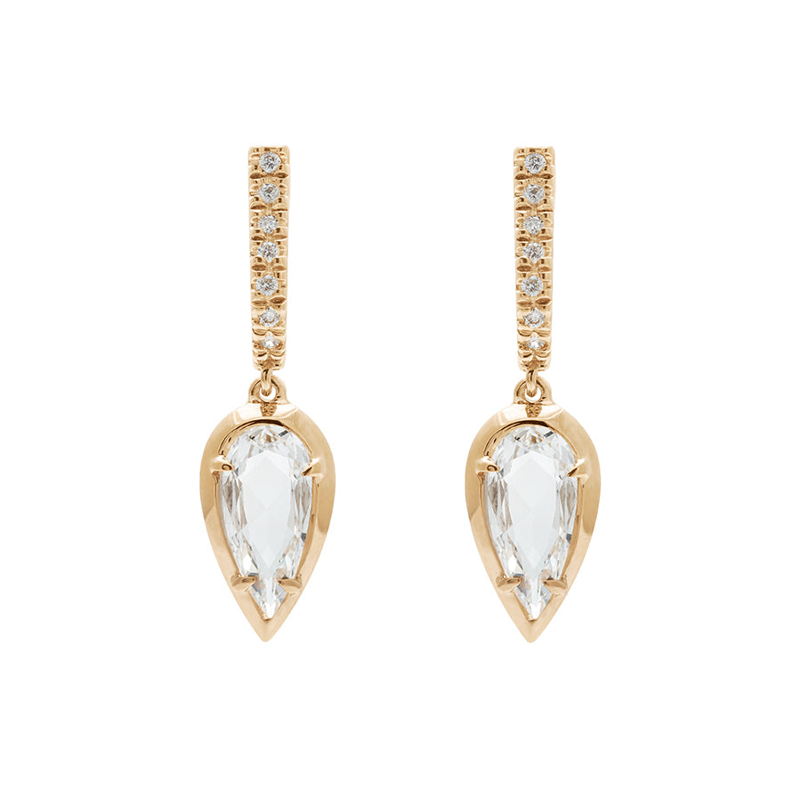 A pair of drop earrings with a U shaped hoop with white diamond pave and a pear shaped white diamond set in yellow gold.