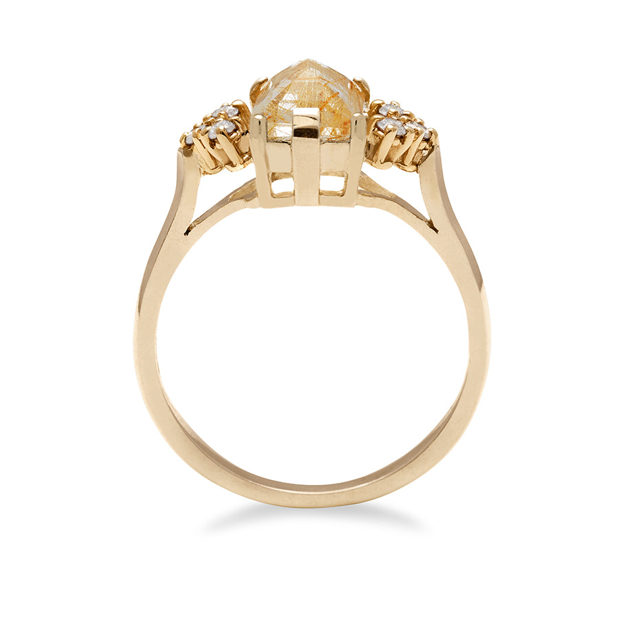 Side view of a ring with an emerald cut golden rutilated quartz center with three round white diamonds on either side in arrow shape, set in yellow gold., Yellow Gold