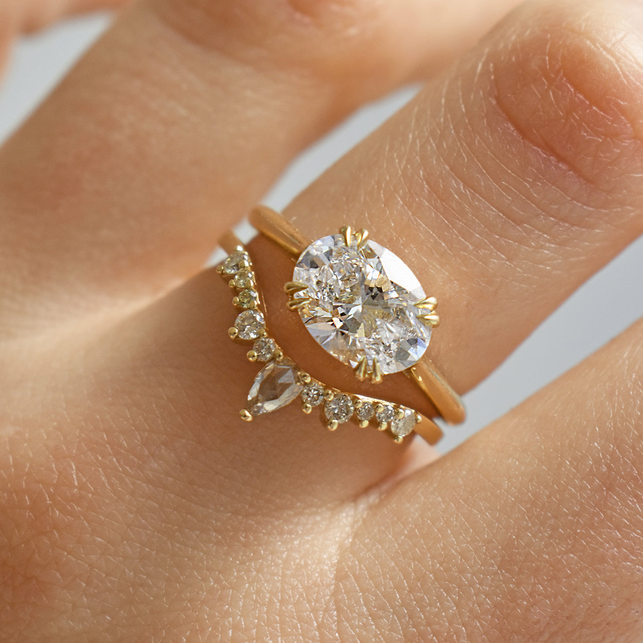 East West Bea Solitaire Ring with Oval center in Yellow Gold, Rose Gold, or White Gold.