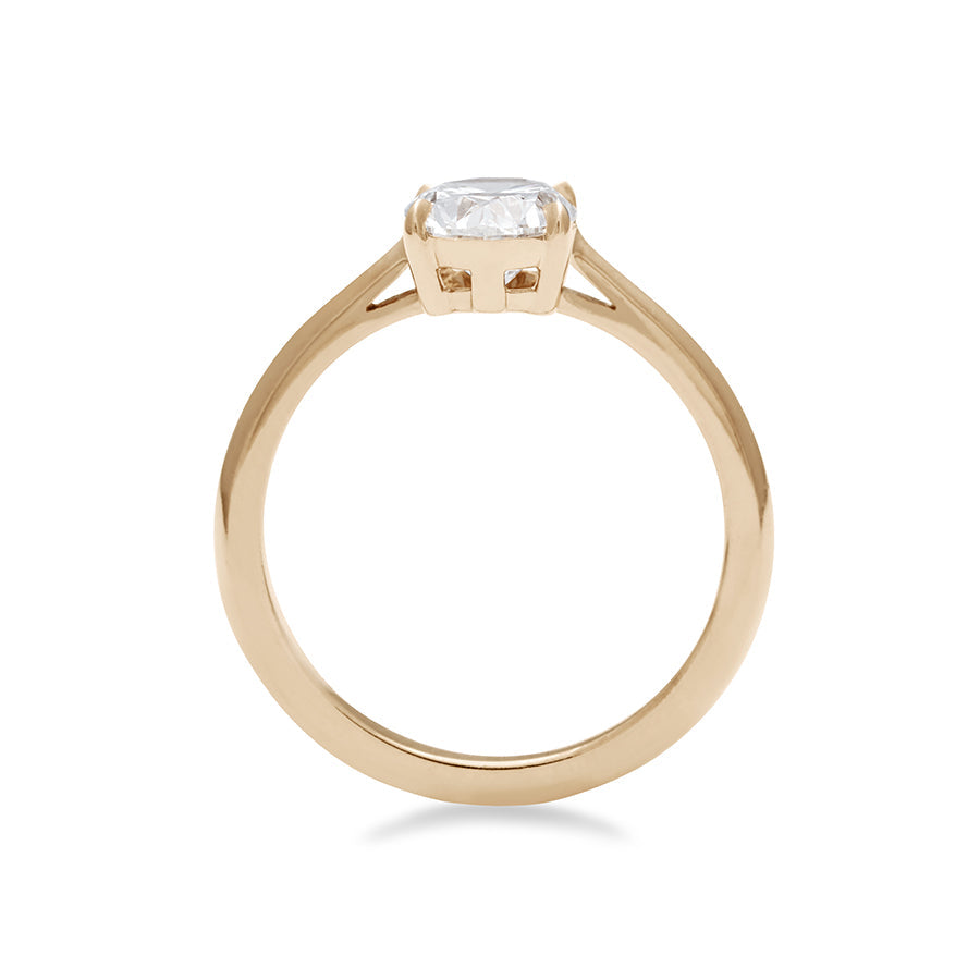 Side view of a solitaire oval brilliant cut 1.25ct lab white diamond set in yellow gold., Yellow Gold