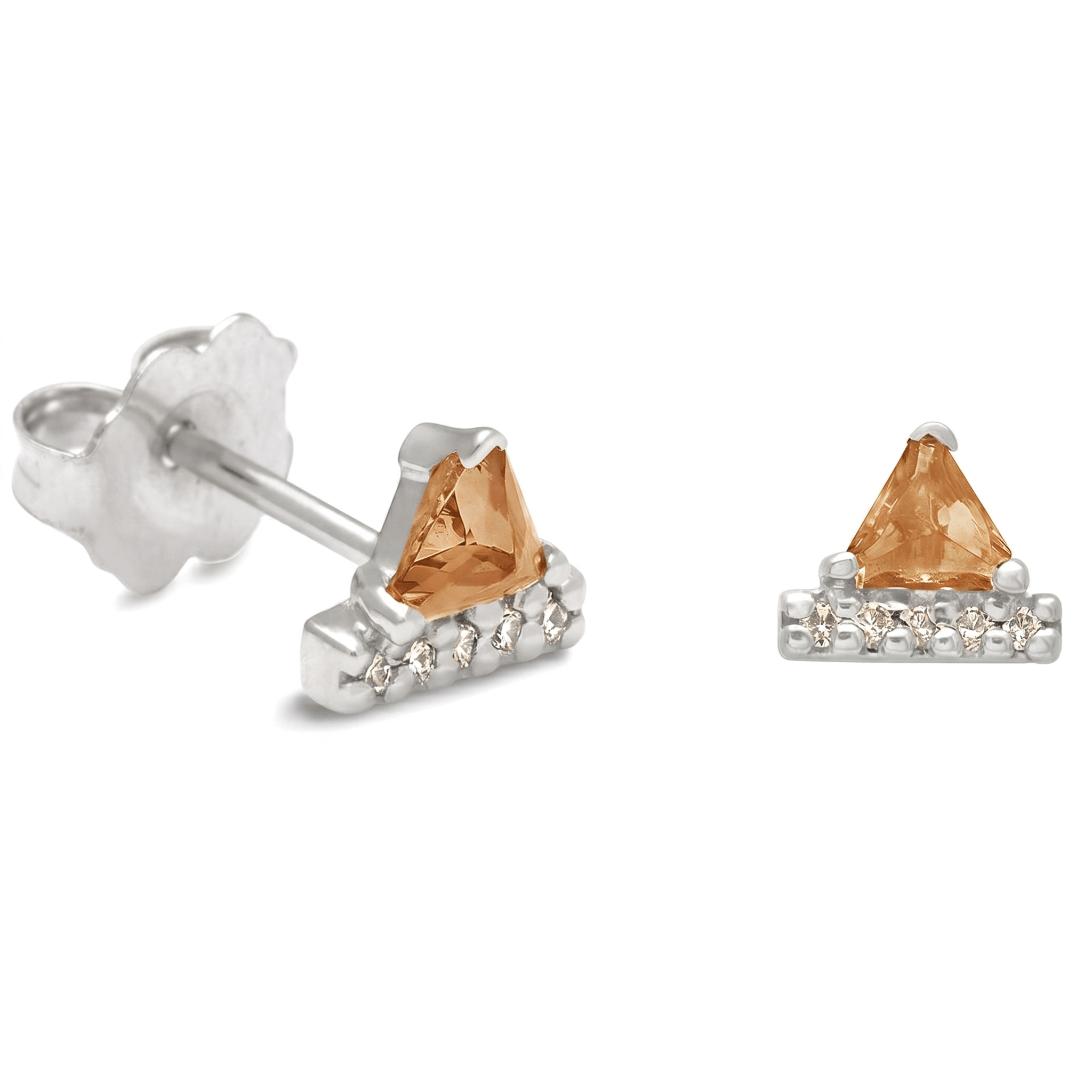 Pair of gold and silver stud earrings on a white background