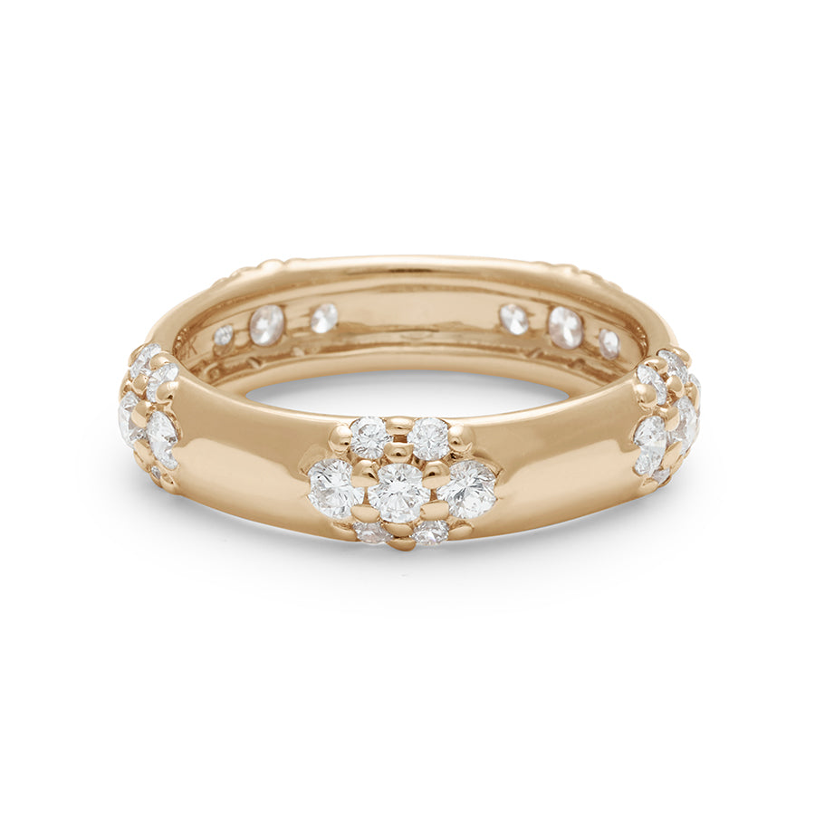 A 5mm straight band with five clusters of white diamonds set in yellow gold.