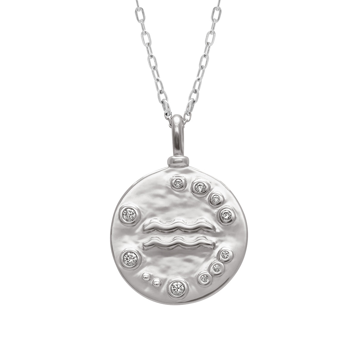A 18mm charm with the Aquarius zodiac sign set in sterling silver with grey diamond stones on a sterling silver chain.