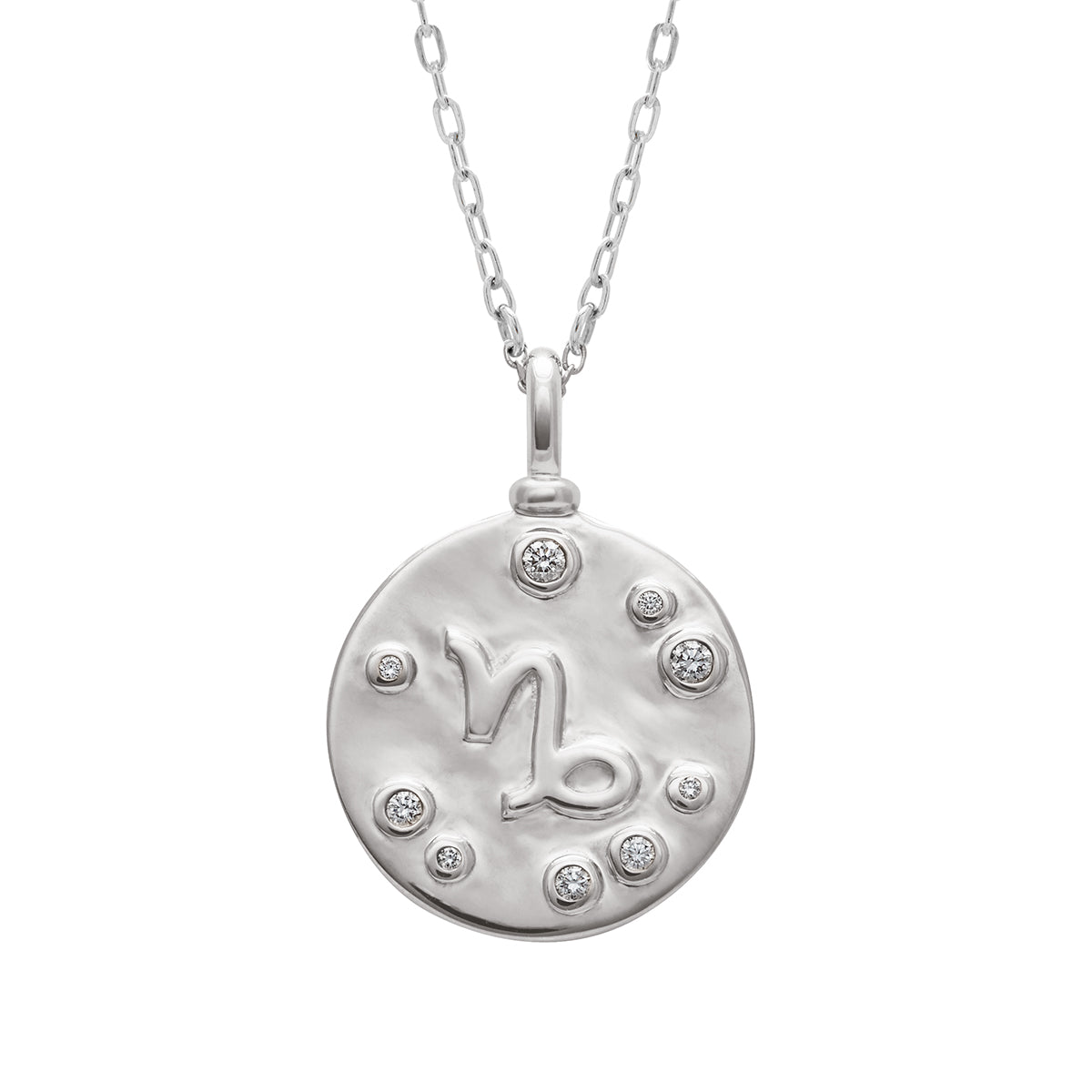 A 18mm charm with the Capricorn zodiac sign set in sterling silver with grey diamond stones on a sterling silver chain.