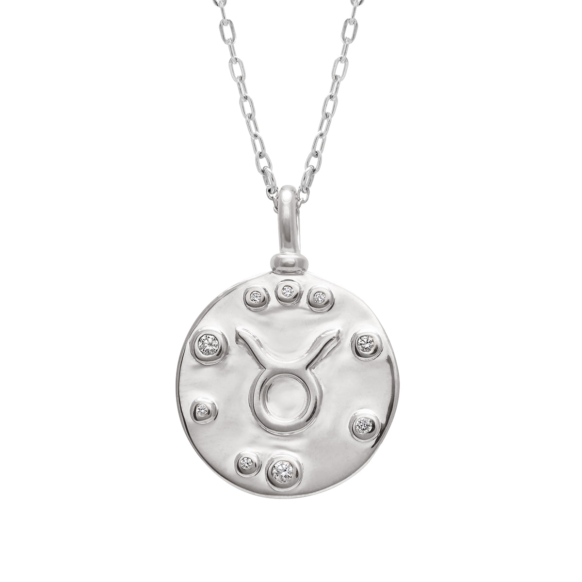 A 18mm charm with the Taurus zodiac sign set in sterling silver with grey diamond stones on a sterling silver chain.