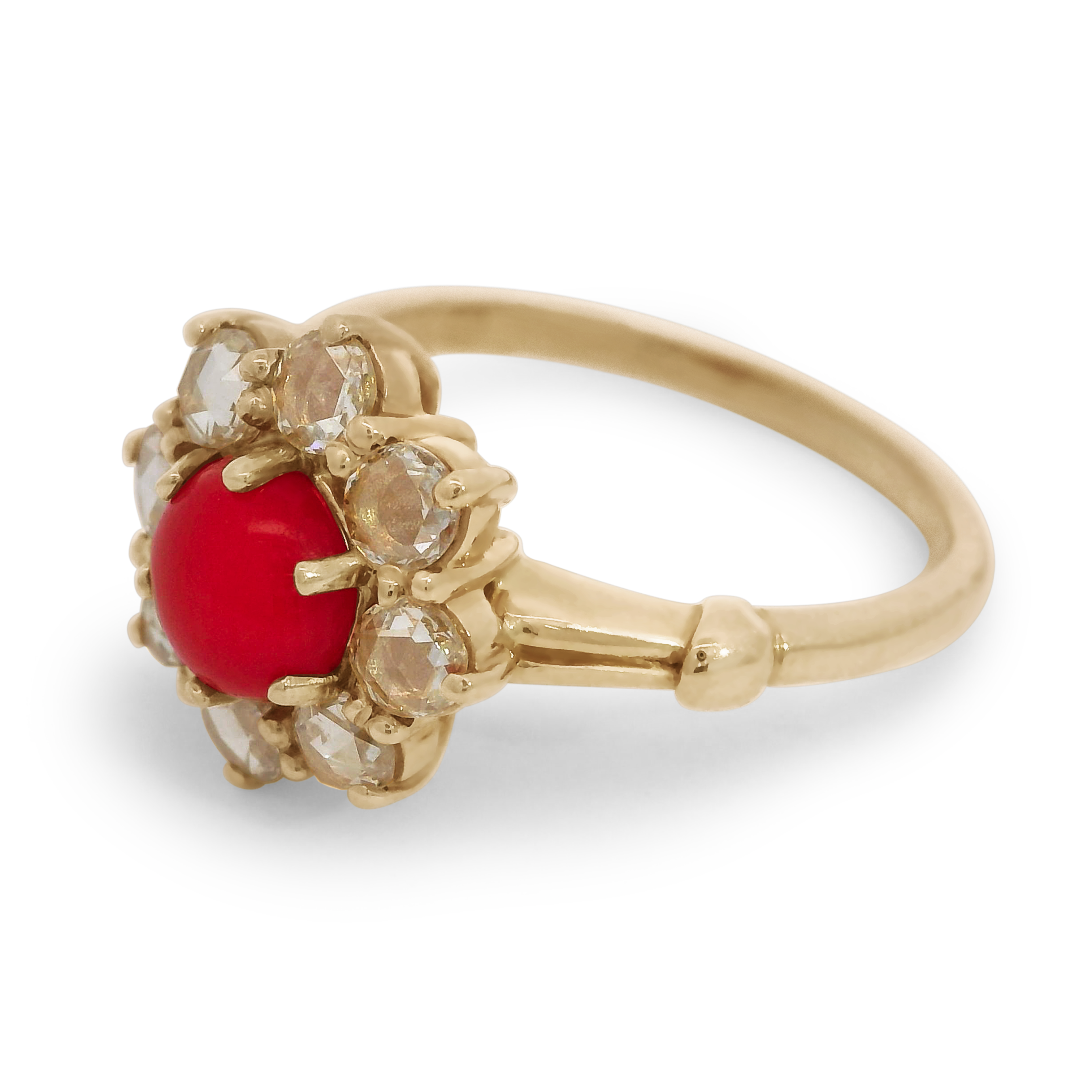 Side profile of round coral center with a rose cut white diamond halo, set in a 14k yellow gold basket and 14k recycled yellow gold shank., Yellow Gold