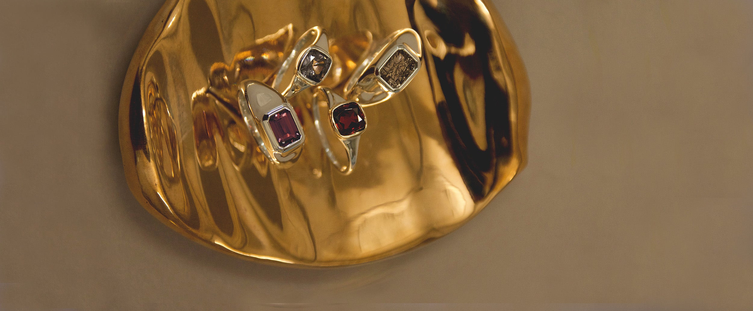 Men's and gender neutral wedding bands on anna sheffield's handmade objects dish