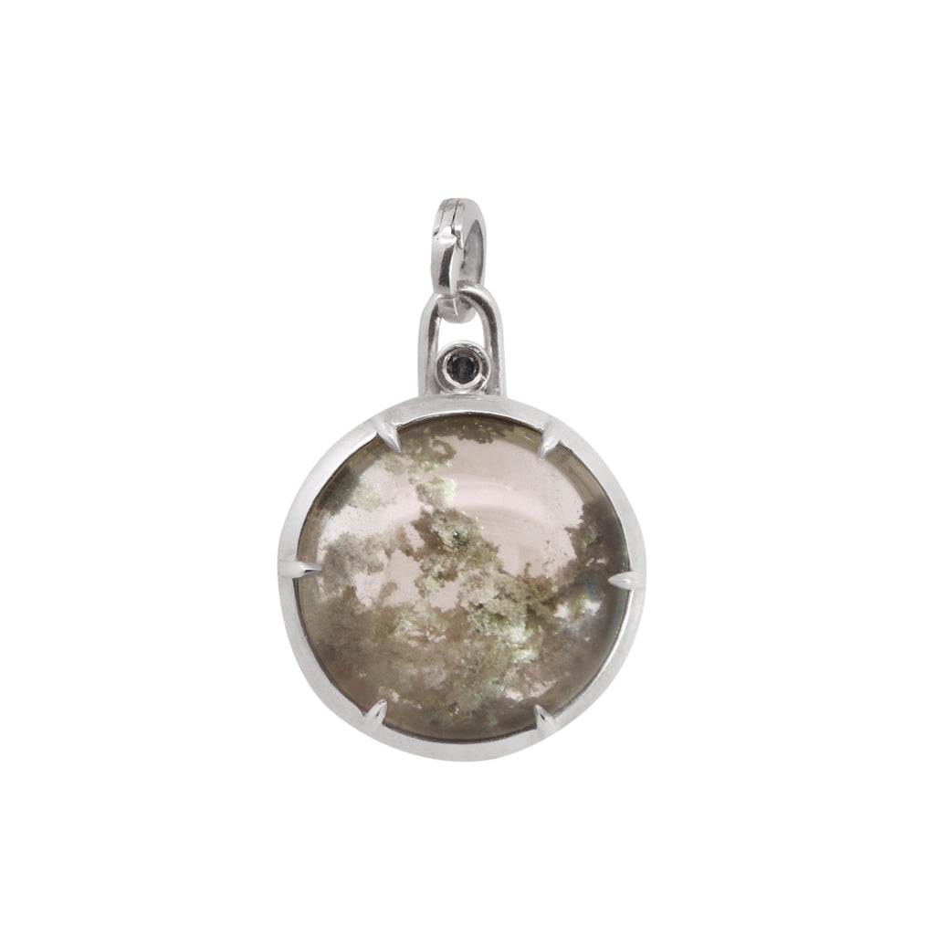 Silver pendant with a round garden quartz on a white backgorund