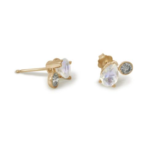 Gold earrings with pear shaped rainbow moonstones and grey diamonds on a white background