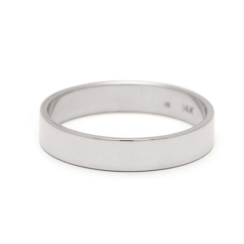 A 4mm flat band set in white gold.