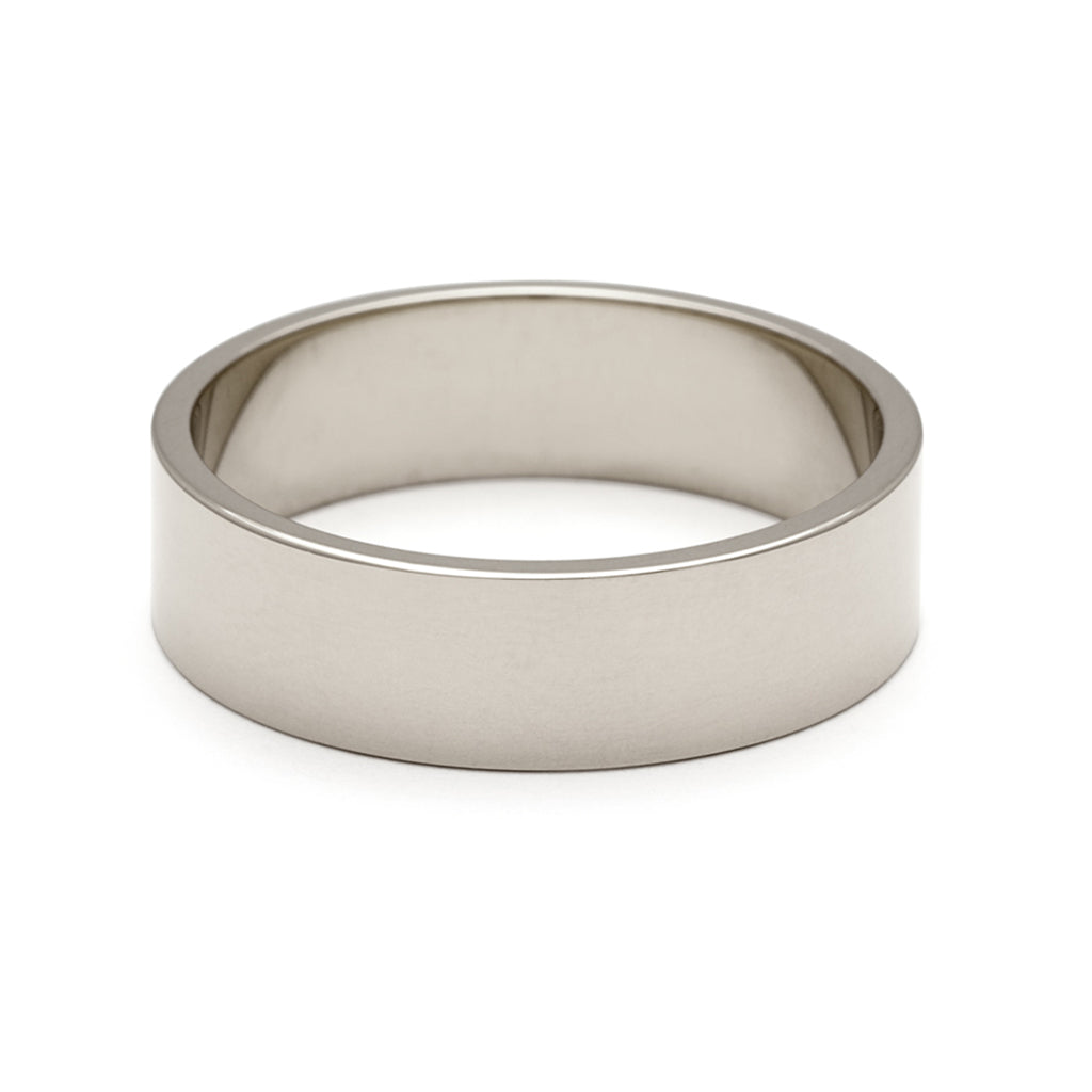 A 5mm flat band set in white gold.
