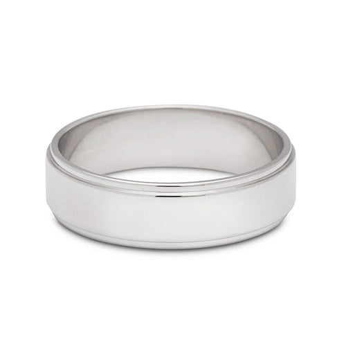 A 5mm flat edge band set in white gold., White Gold