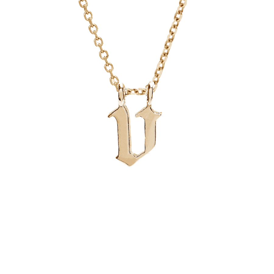 A "v" initial charm set in yellow gold on a yellow gold chain., Letter V