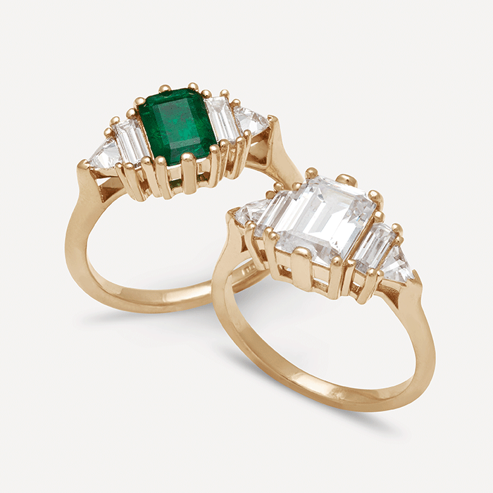 Theda engagement rings by anna sheffield with white diamond and green emerald stones.