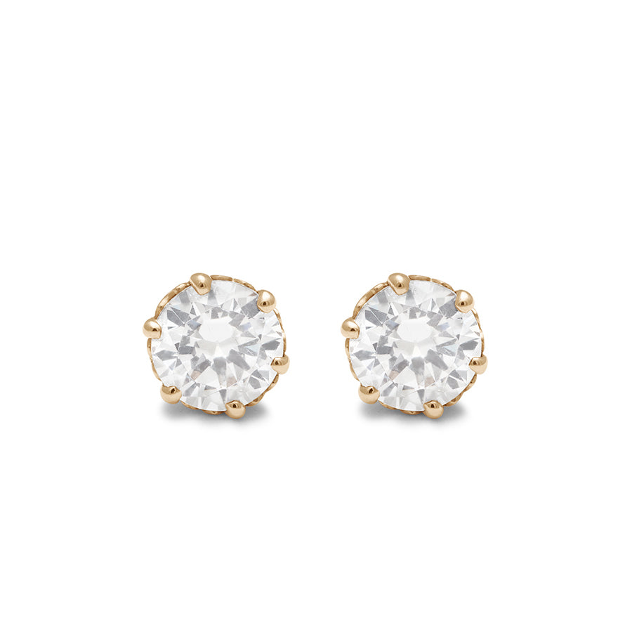 A pair of 1.25ct white diamond stud earrings set in an intricate basket in yellow gold., Yellow Gold