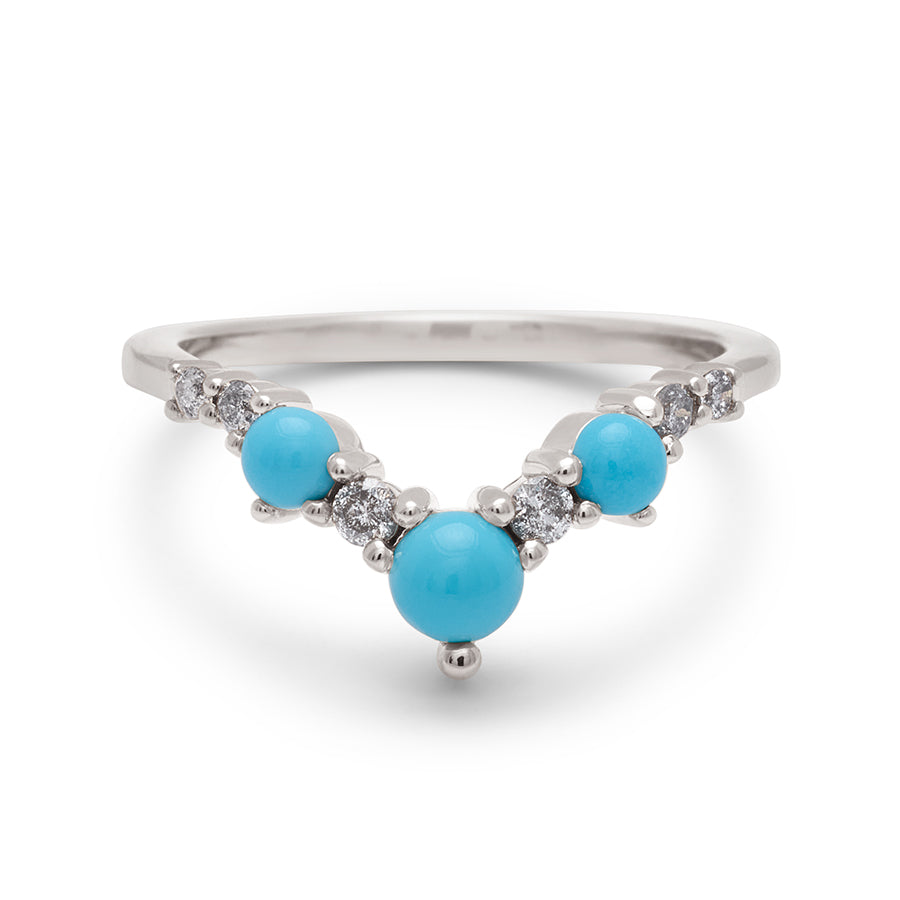 A band with three large turquoise stones with grey diamonds in between set in white gold., White Gold