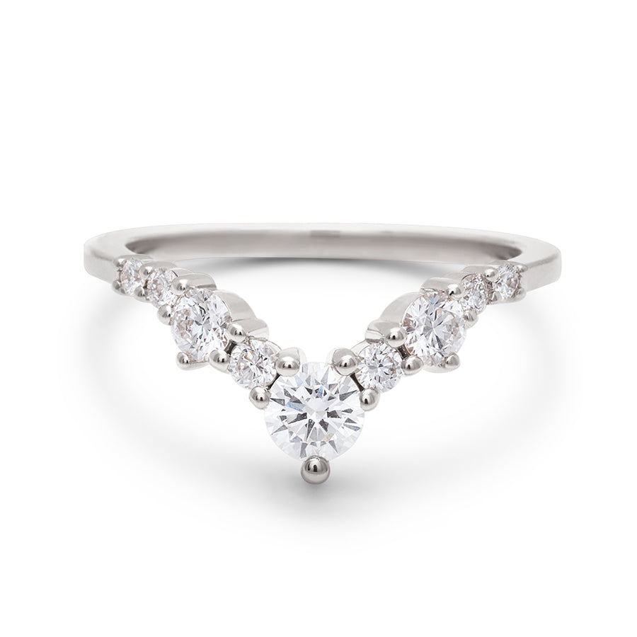 A band with large white diamonds in ascending size set in white gold., White Gold