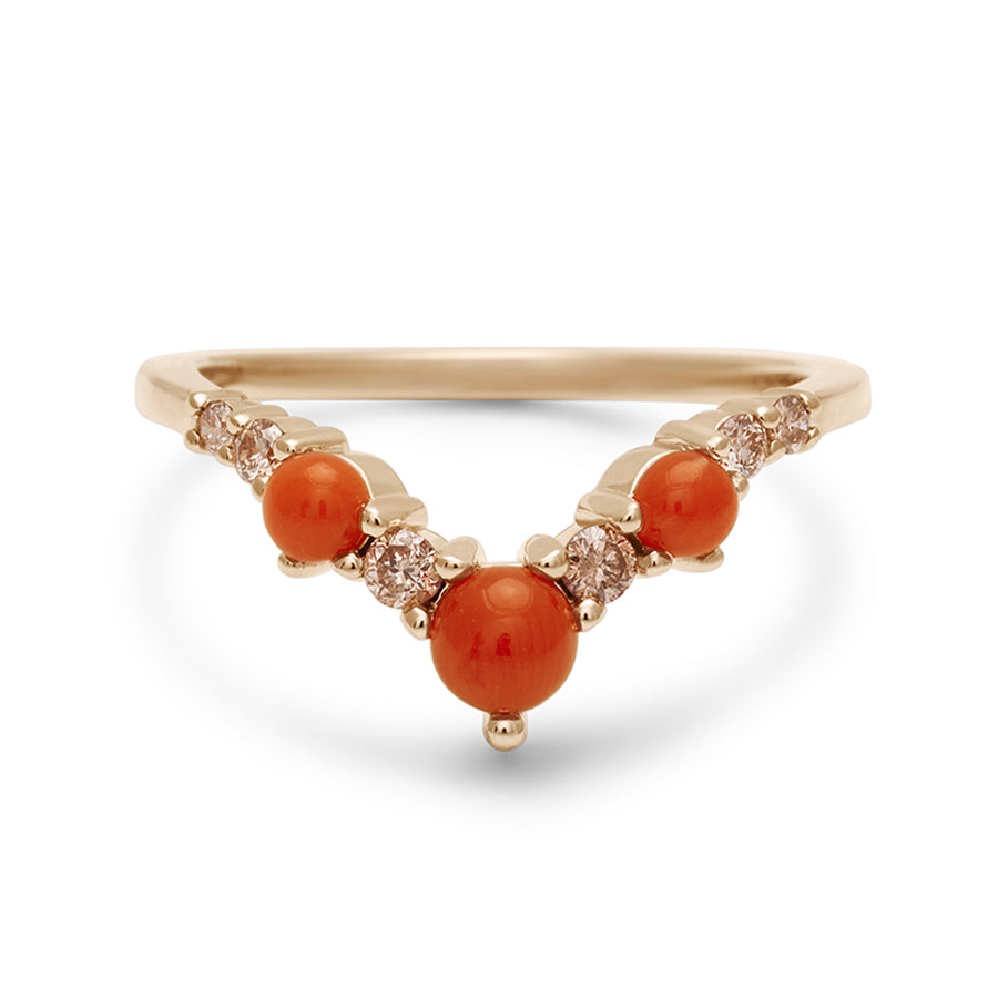 A band with three large coral stones with champagne diamonds in between set in yellow gold., Yellow Gold