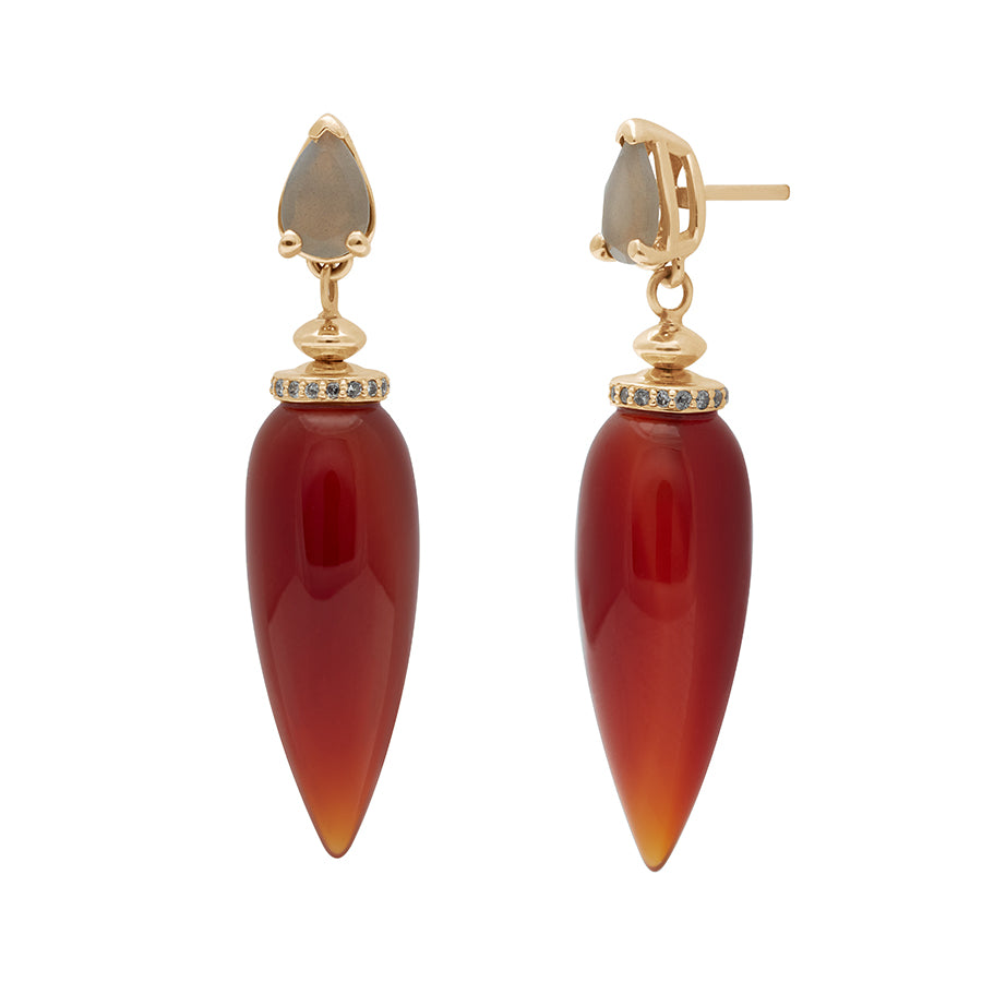 A pair of carnelian drop earrings with a grey diamond halo at the top and a pear grey moonstone set in yellow gold one earring angled.