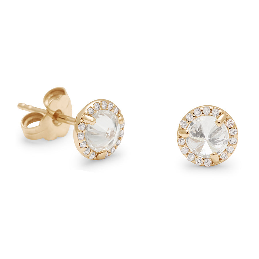 A pair of medium lab white diamond center stone earrings with a halo of white diamonds set in yellow gold one earring angled., Yellow Gold