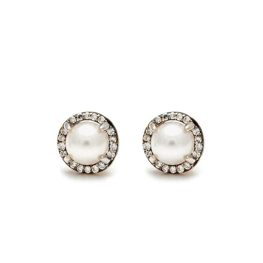 Pair of pearl earrings with diamond accents on a white background