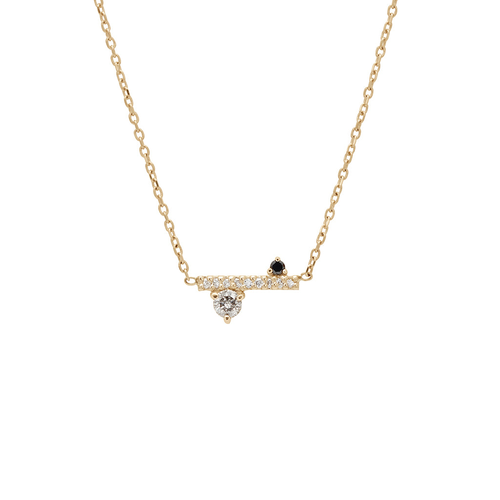A straight line of white diamond pave with grey and black diamond accent stones on either side set in a yellow gold necklace chain., Yellow Gold