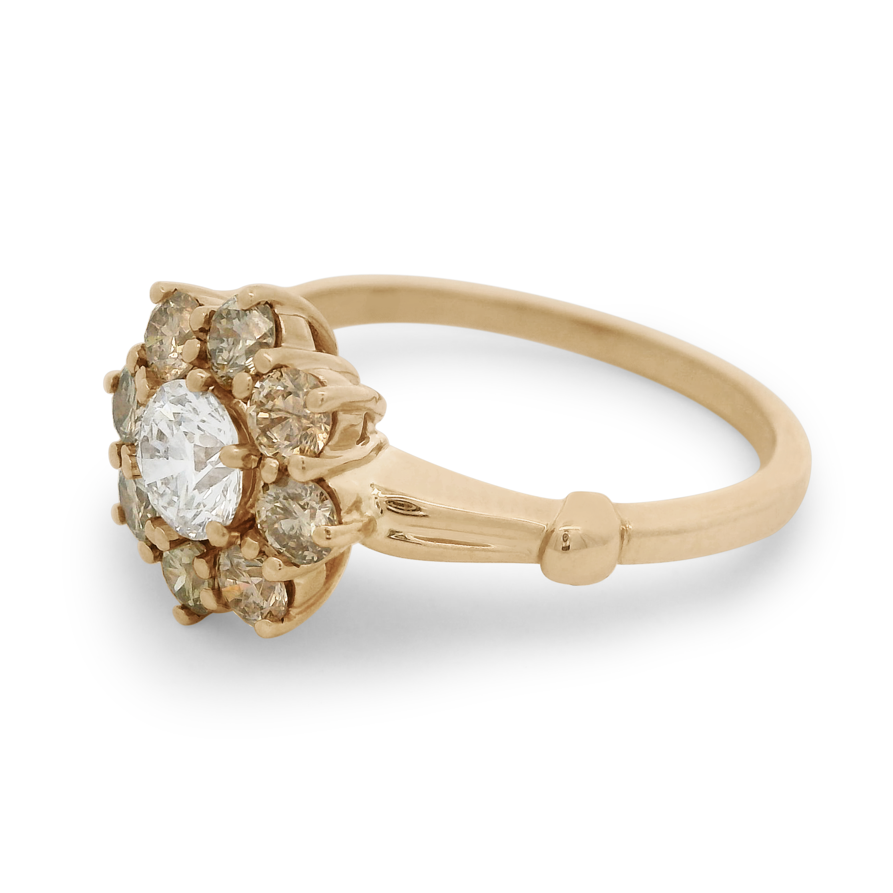 A cluster engagement ring with a white diamond center stone and champagne diamond side stones surrounding it set in 14k yellow gold., Yellow Gold