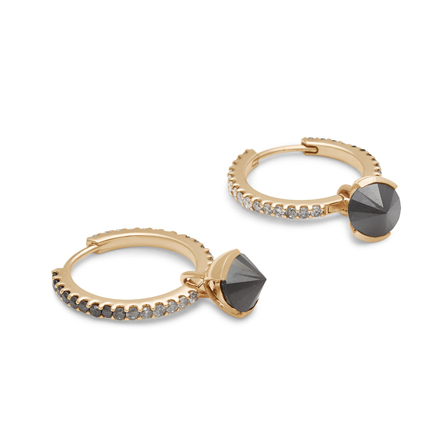 Side view of a pair of eternity hoops with ombre of black to grey to white diamonds with a black diamond droplet set in yellow gold.