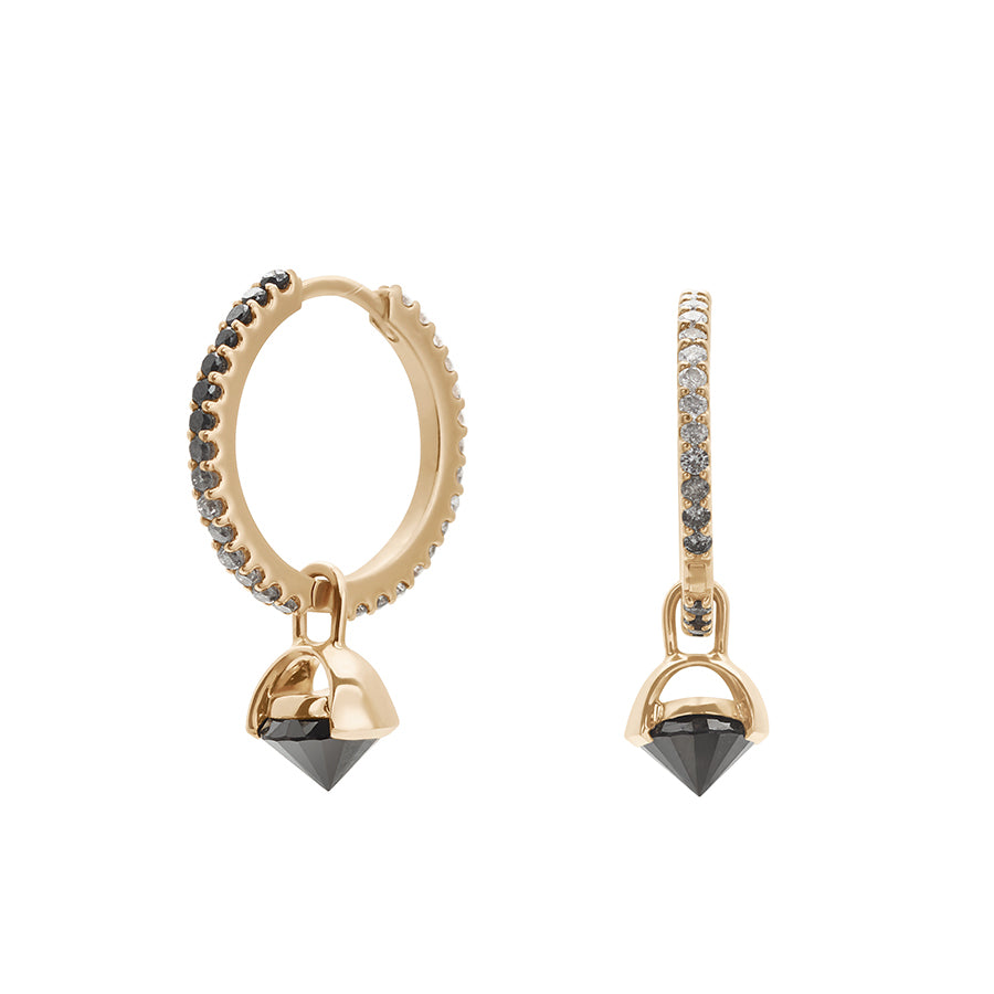 A pair of eternity hoops with ombre of black to grey to white diamonds with a black diamond droplet set in yellow gold one earring angled.