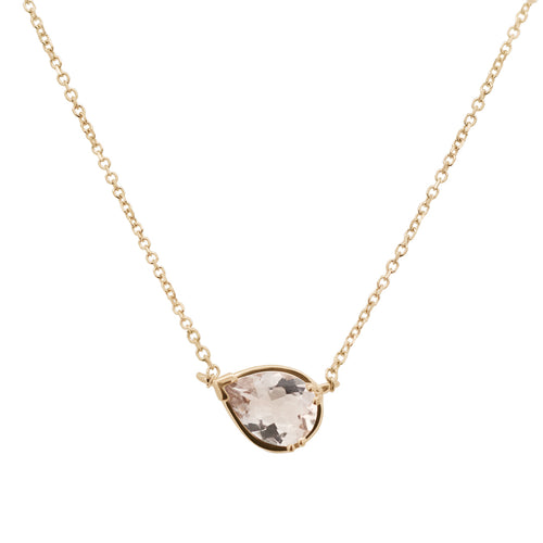 A delicate gold chain necklace featuring a teardrop-shaped pale pink gemstone in a gold bezel setting, displayed against a solid white background.