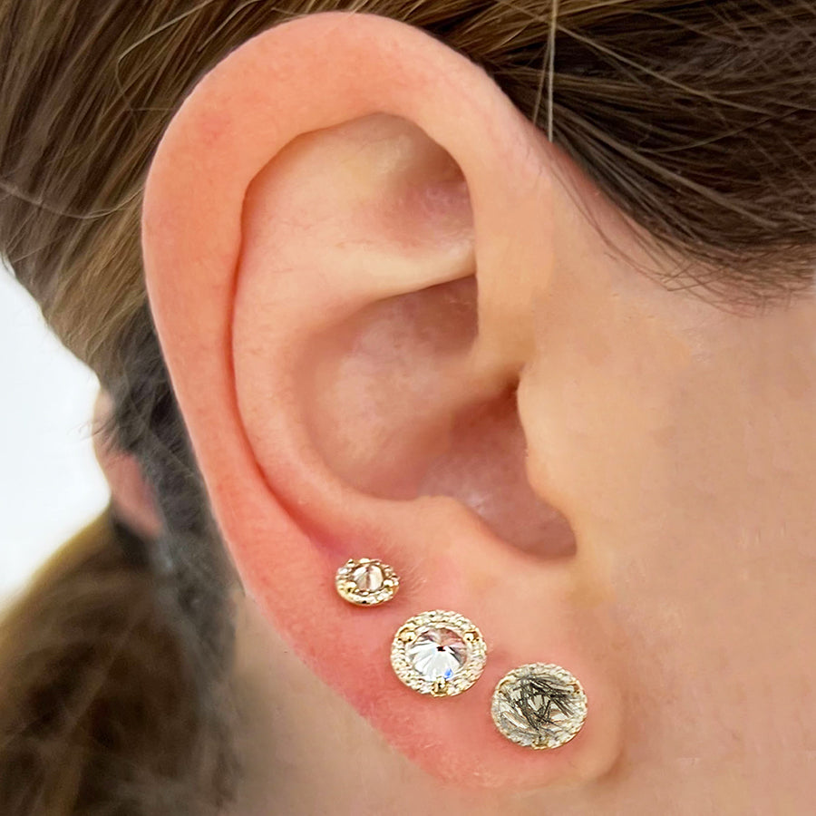 Female ear wearing Rosette Stud Earring (Medium) - 14k Gold, Rainbow Moonstone & Champagne Diamonds