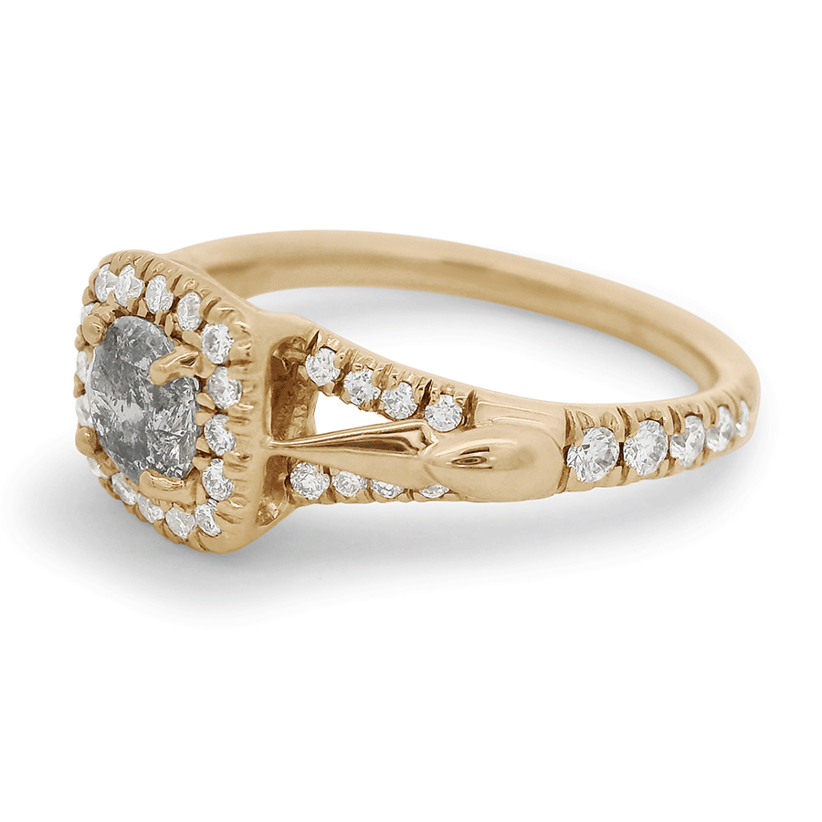 Side profile of sheaves bauble ring with a round grey diamond set in 14k yellow gold.