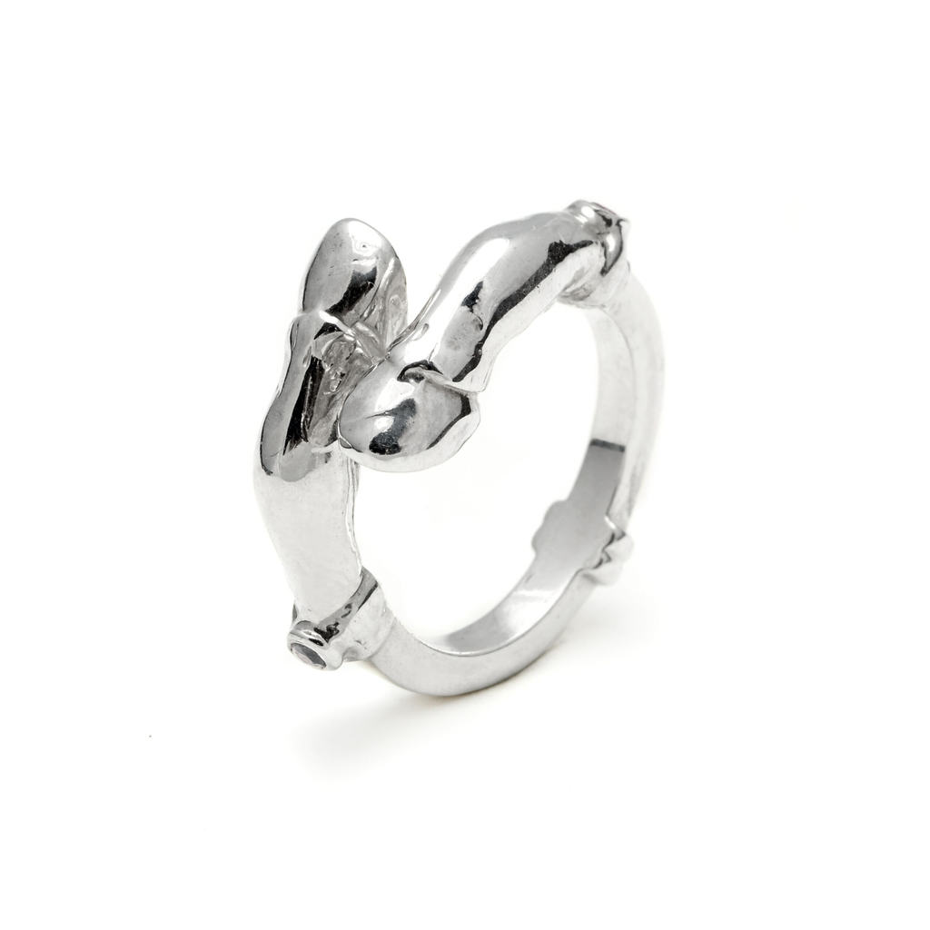 Sterling Silver 
Silver ring with two horse hooves on a white background