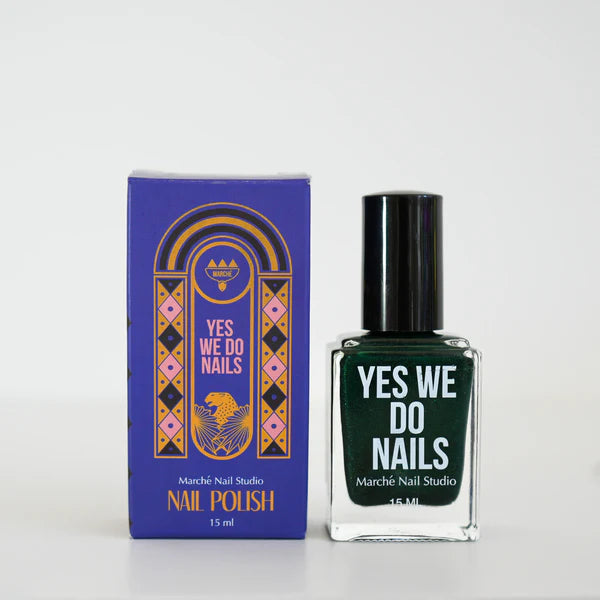 Yes We Do Nails nail polish bottle and packaging on a white background