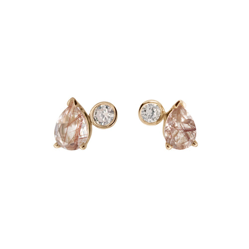 A pair of stud earrings featuring pear shaped copper rutilated quartz and round champagne diamonds set in yellow gold against a white background. 