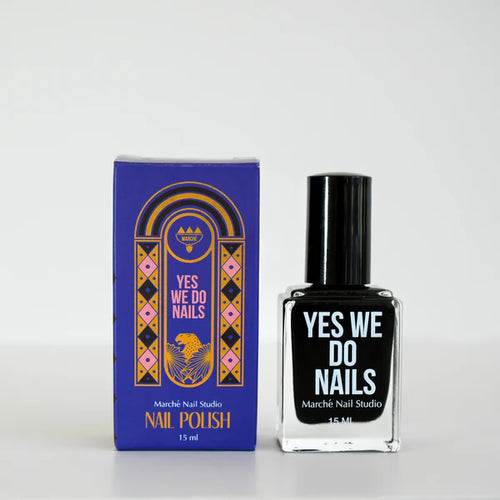 Nail polish bottle and packaging with 'YES WE DO NAILS' branding on a white background