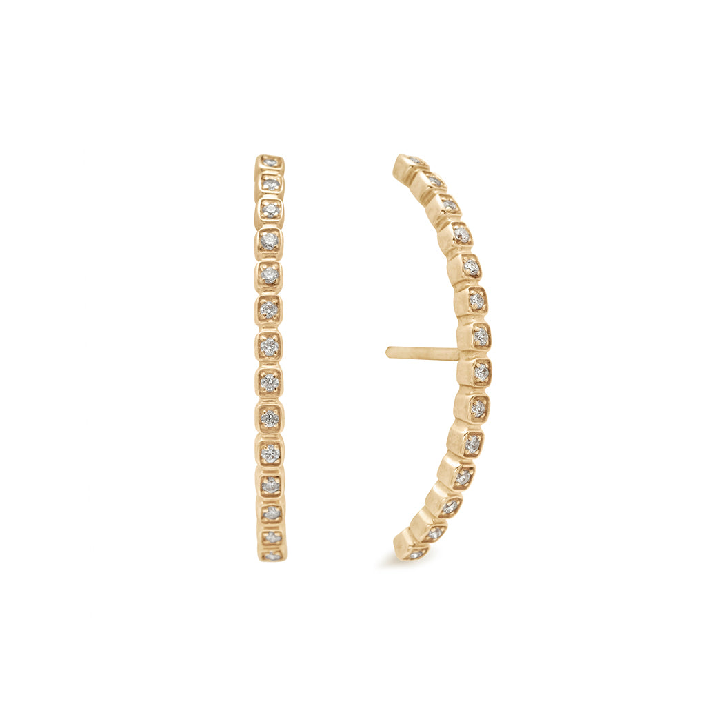 A pair of grey diamond dusted curve earrings set in yellow gold one earring angled., Yellow Gold