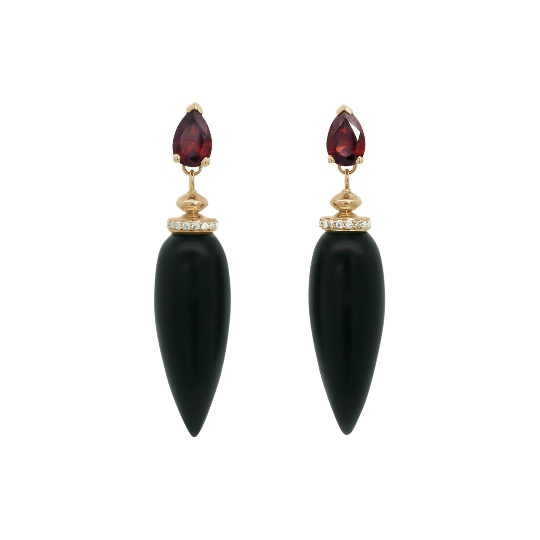 Black onyx pendulum earrings featuring white diamonds and red garnet set in yellow gold 
