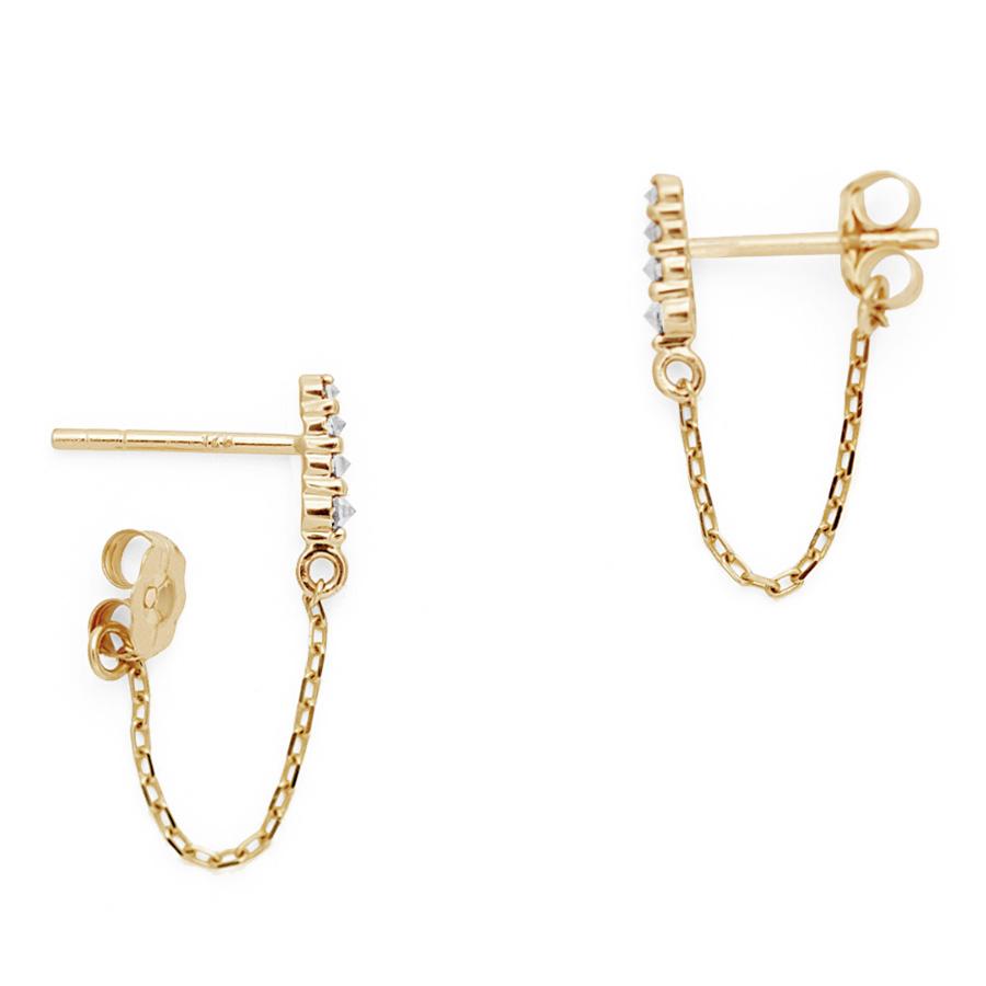 Side view of a pair of earrings with four white diamonds with a chain connecting to the ear back set in yellow gold., Yellow Gold