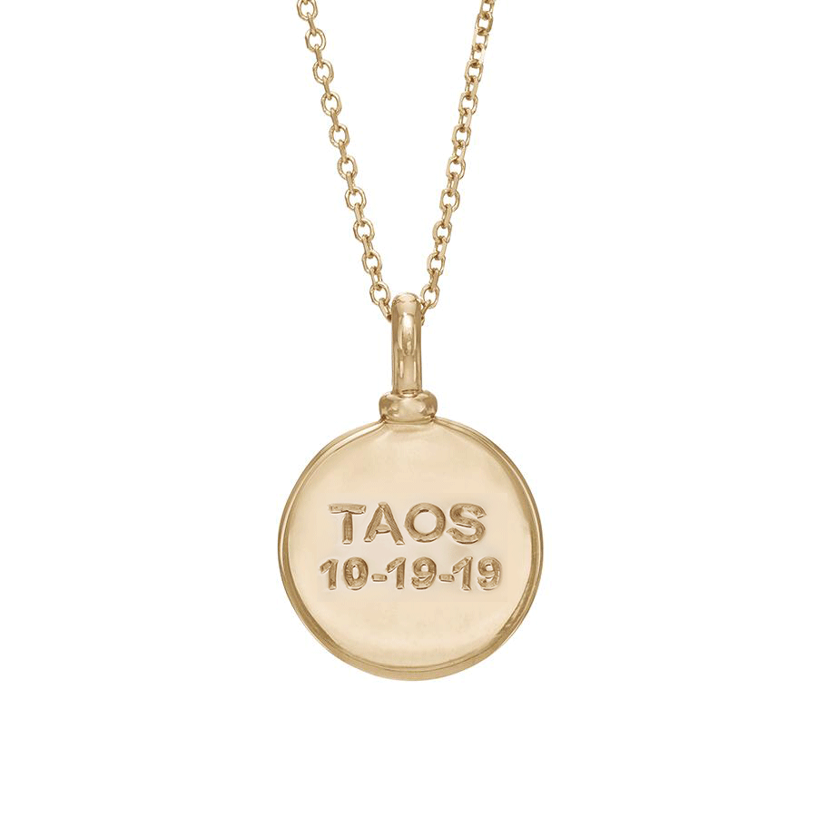 A 14mm plain gold charm set in yellow gold on a yellow gold chain with "TAOS 10-19-19" engraved on., 14mm