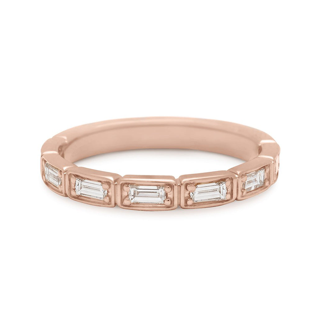 A white diamond baguette band that has diamond goes around 3/4 of the band set in rose gold., Rose Gold