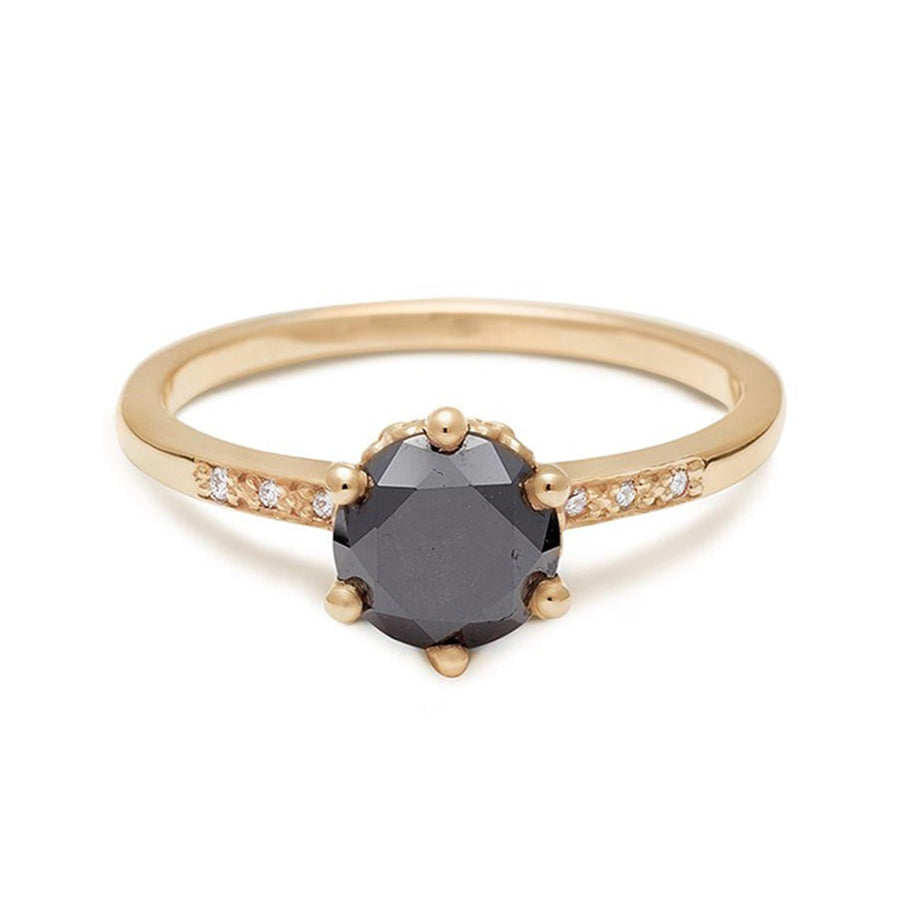 A solitaire ring with a round 1.00ct black diamond with white diamond pave on either side set in yellow gold., Yellow Gold